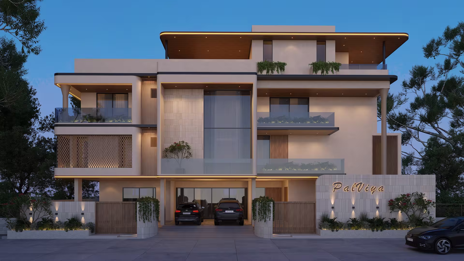 A contemporary multi-level residential building named "PalViya" with large windows, stone wall accents, integrated greenery on balconies and two cars parked in an open garage under a dark blue sky.